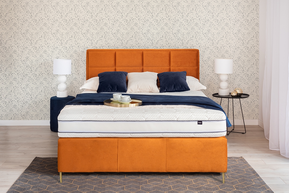 Łóżko tapicerowane sypialniane z pojemnikiem Menir - 180x200, nogi złote łóżko tapicerowane z wysokim wezgłowiem 