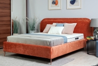 Łóżko tapicerowane sypialniane ze stelażem Delmi - 180x200, nogi miedziane łóżko do sypialni z miękkim wezgłowiem 